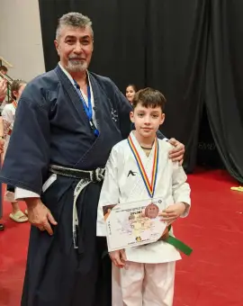 Foto Medalie de argint pentru Andrei Ştefan Dima, sportiv legitimat la GEIDO Slatina, la Campionatul Naţional de Karate Tradiţional