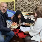 Foto O femeie, din Voineasa, sărbătorită de autorităţi la împlinirea a 100 de ani de viaţă