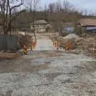 Foto Drumul județean din zona Voineasa, redeschis după reparațiile de urgență la un pod (FOTO)