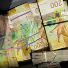 Foto Poliţistul cu jumătate de milion de franci în casă. Cum se îmbogățea un angajat al IPJ Argeș din prostituție în Elveția