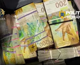 Foto Poliţistul cu jumătate de milion de franci în casă. Cum se îmbogățea un angajat al IPJ Argeș din prostituție în Elveția