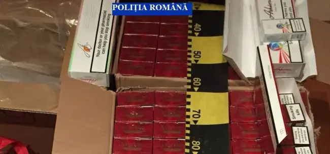 Foto FOTO. Poliţiştii au găsit aproape 38.000 de ţigarete de contrabandă şi 50 de litri de alcool etilic, în urma perchiziţiilor de vineri