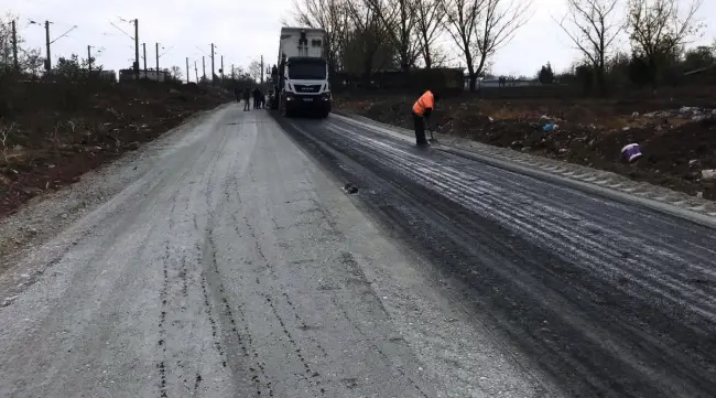 Foto  FOTO&VIDEO. Start la asfaltare pe noua centură ocolitoare a Caracalului