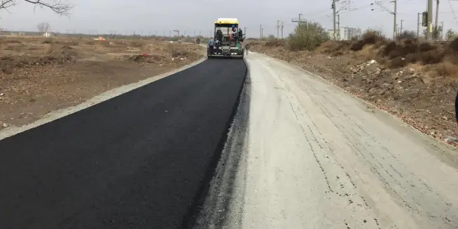 Foto  FOTO&VIDEO. Start la asfaltare pe noua centură ocolitoare a Caracalului