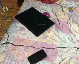 Foto Minoră din Olt, obligată să producă materiale cu caracter pornografic. Percheziții ale DIICOT 