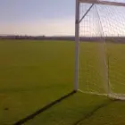 Foto Cum se realizează un teren de sport cu suprafață de joc iarbă?